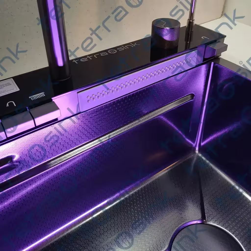Close-up of a metallic purple and black Multifunctional sink tetrasink waterfall kitchen sink best modern kitchen sink  with 'Tetrasink' branding.