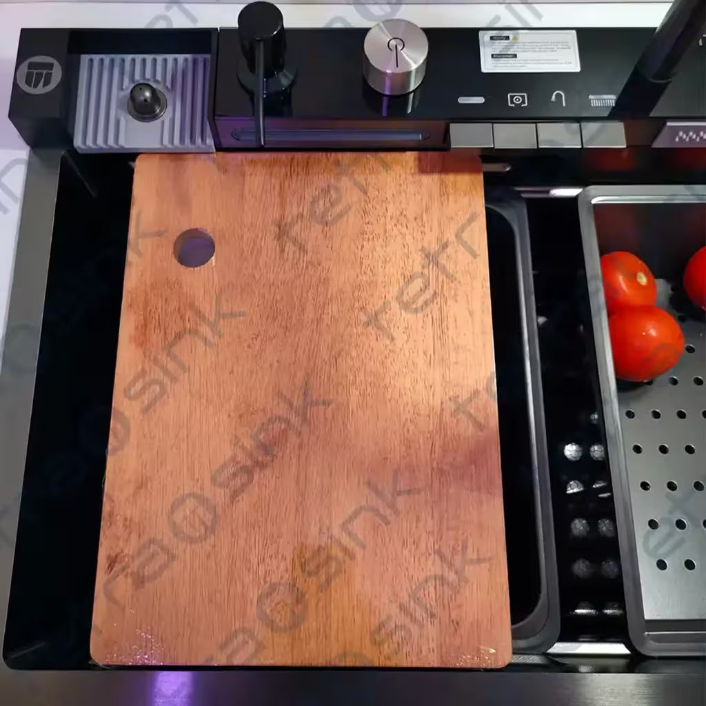 Wooden cutting board on a Multifunctional sink tetrasink waterfall kitchen sink best modern kitchen sink with a knife sharpener and tomatoes in the background.