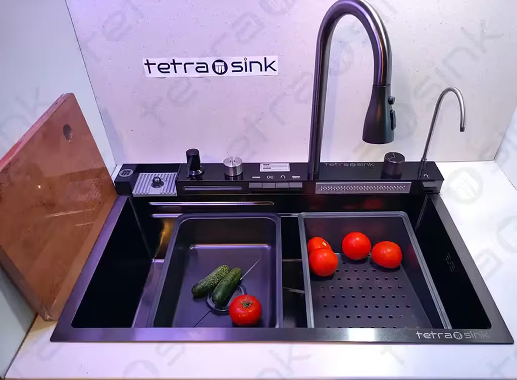 Multifunctional sink best Modern kitchen sink with tetrasink branding, tomatoes, and cucumbers on a white countertop.