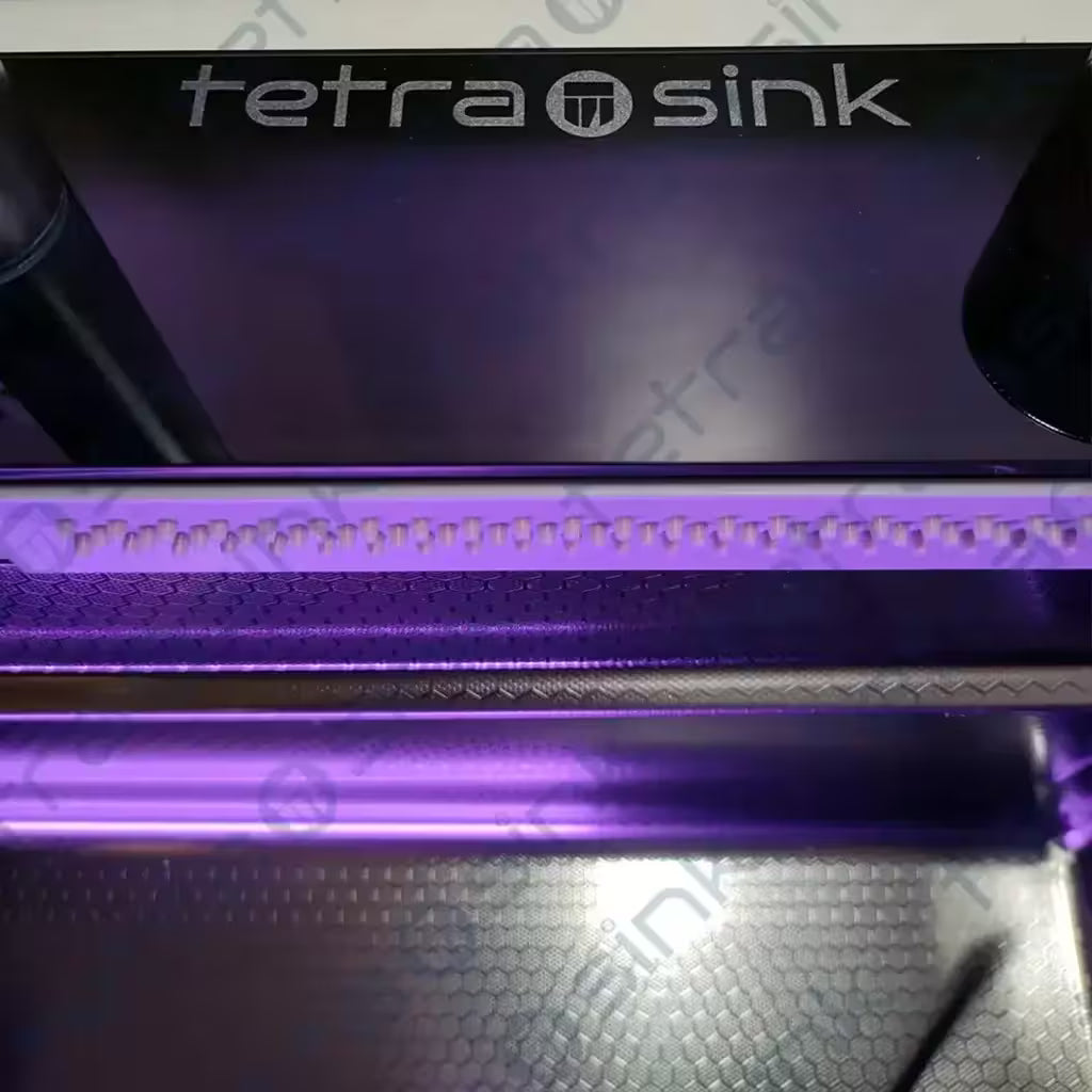 Purple and black Multifunctional sink best Modern kitchen sink with 'tetrasink' branding on a reflective surface.