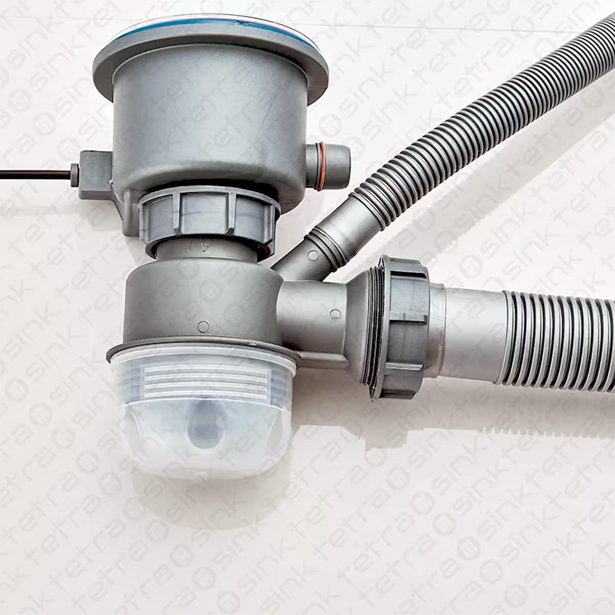 Plumbing system with pipes and connectors on a textured white background